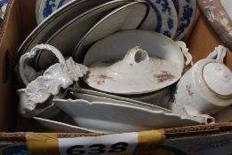 A collection of 19th century dinner ware to onclude tureen, teapot, platters etc.