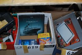 Titanic Experience book and DVD's with two 1st edition Harry Potter books.