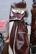 A good set of golf clubs in bag, with wheels etc