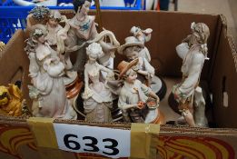 Nine Capodimonte figurines.