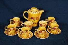 A Pallissey Tauras coffee set with coffee pot, cups and saucers.