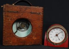 A 20th century oak cased pigeon clock together with a Kodak Eastman timer set within original red