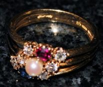 A diamond, sapphire, ruby and pearl ring 18k. Size U