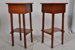 A pair of 20th century oak bedside tables. Rustic construction with angular squared legs, a lower