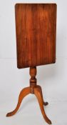 A 19th century George 3rd Mahogany tilt top occasional tripod wine table. The three splayed legs
