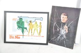 A large James Bond unframed poster of Roger Moore together with a reproduction Dr No poster with