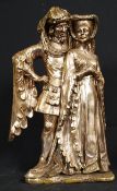 A stoneware statue of (believed) William & Mary in a gilt finish. 37cm tall.