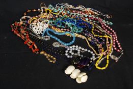 A collection of costume jewellery to include mostly bead necklaces along with some bracelets etc