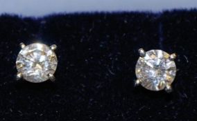 A pair of diamond earrings, Approx 50 pts.