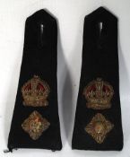 A pair of black epaulettes with real silver wire with the ranking of Lieutenant Colonel and crown