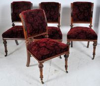 A set of 4 Victorian oak dining chairs in the manner of Lamb of Manchester. The tapered legs with
