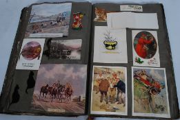 An early scrap album containing folio prints, greetings cards, hunting prints, postcards etc