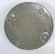A Pewter Art Nouveau plaque / tray with embossed decoration.