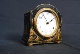 A good 1930`s chinoserie decorated mantel clock stamped to the face for Walker & Hall of Sheffield.