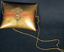 An early 20th century copper and brass ladies hand bag with decorative clasp. 15cm x 18cm.