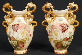 A pair of Austrian R Henke Worcester style Ivory blush vases both being stamped RH to base having