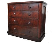A Victorian large flame mahogany 2 over 3 chest of drawers. The large chest with 2 short over 3