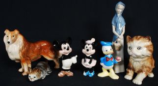 A mixed lot of china figurines to include a Melba Collie dog, Melba cat, vintage Disney figurines