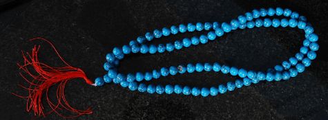 A set of turquoise Tibetan prayer beads
