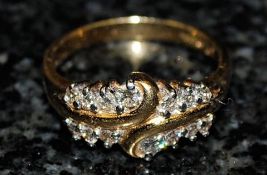 A diamond crossover ring 18k approx 30pts. Size V