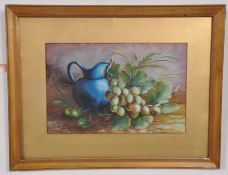 A framed and glazed oil on board. A still life painting of a jug and grapes signed K.G.V.