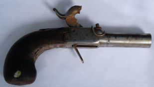 An 18th century flintlock muff pistol having palmette engraved turn off barrel with a folding
