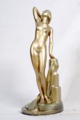 A 1930`s plaster statue of a nude on plinth base. Marked British Made to reverse. 38cm tall.