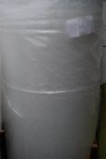 A large roll of bubble wrap 150cm x 53cm x 53cm.