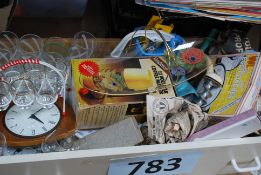 A box of retro kitchenalia to include mincer, cloocks, plates, glasses bowls etc.