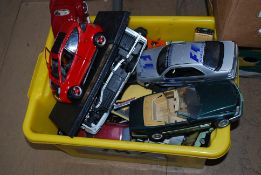 A box of large scale diecast toy cars