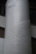 A large roll of bubble wrap 150cm x 53cm x 53cm.