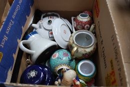 A box of oriental porcelain to include Japanese and Chinese ginger jars, plates, teapots etc