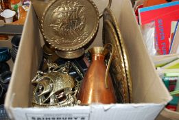 A mixed lot of brasswares to include horse brasses, candlestick holders and other items