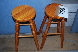 Two pine bar / kitchen stools.