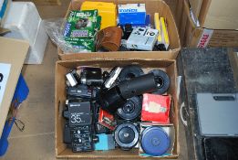 2 boxes of assorted vintage cameras and accessories to include film projectors, flashes etc.