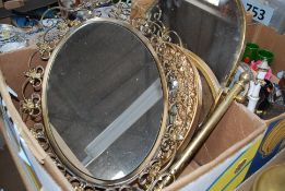 A brass swing toilet mirror together with 2 other decorative metal and gilt mirrors