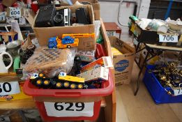 A box of vintage toy cars, vintage cased dominos set, wooden chess board and pieces along with a box