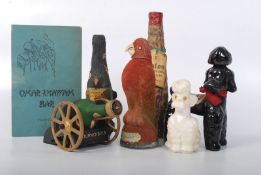 Breweriana to include several decorative miniature bottles, one in poodle form, log form etc along