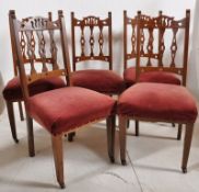 A set of 5 Victorian Arts & Crafts oak dining chairs in the Liberty style. Square tapering oak legs