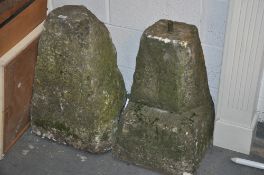 2 19th century staddle stones of inverse square tapering form. One having cast iron rod inset to