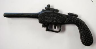 An American cast iron Bulldog bootjack / bootjack in the form of a pistol