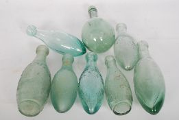 A collection of 19th century Hamilton / torpedo bottle / bottles to include an early J Schweppe &