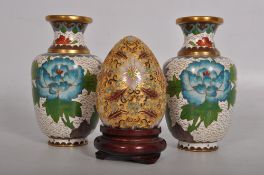 2 Japanese enamel decorated vases and an enamel egg. 13cm tall.