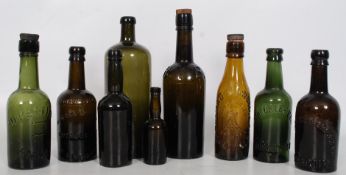 A collection of green and glass bottles to include Imperial of Runcorn, D Pettifor of Ansty, Thomas
