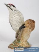 A Beswick Lesser Spotted Woodpecker, model number 2420
