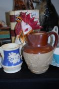 A Denby Harvest stoneware glazed jug together with a French jug in the form of a cockerill and 1