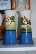 A pair of Torquay Ware vases