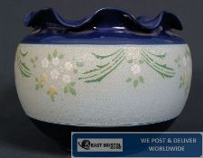 A Lovatt Langley jardiniere having foliate decoration being marked to the base. 21cms high x 25cms