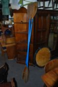 An unusual pair of mid 20th century double ended wooden paddles. 215cms long