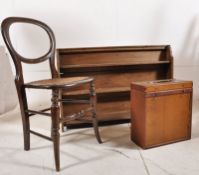 An early 20th century pine hanging rack together with an oak record carrying case and a balloon